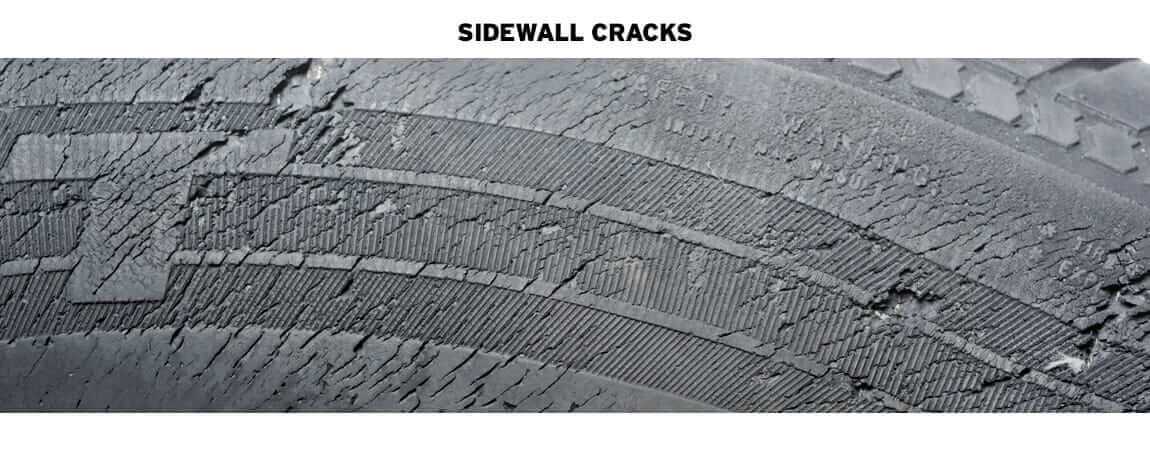 TIRE DAMAGE INCLUDING CRACKS, TREAD WEAR, AND SIDEWALL BULGES